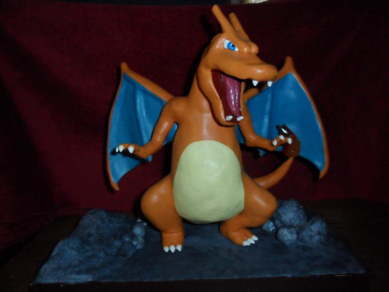 12" Charizard statue on wooden base