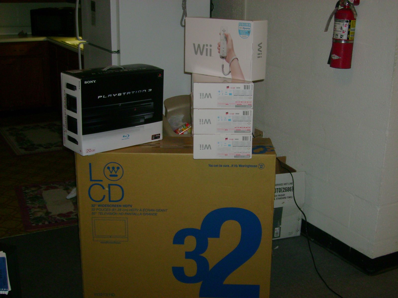 4 Wiis, a 32" plasma display (1080p), and a 20GB Playstation 3 system on the Playstation release date! (we, my next door neighbour and I, got escorted