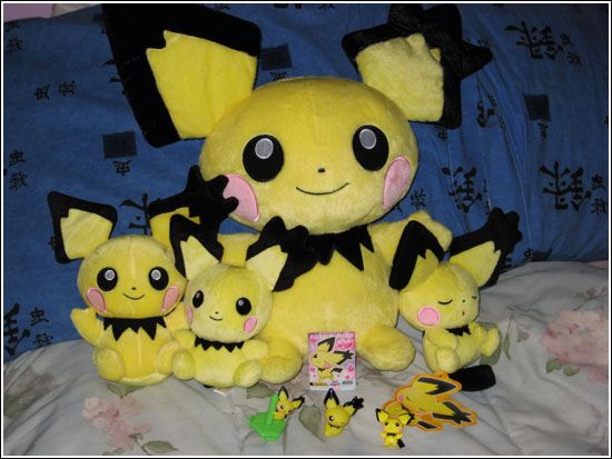 A group picture of all my Gizamimi Pichu items as of July 8, 2009. Large Tomy plush (she's bigger than the 1/1 plushes!), small Tomy plush on the far-