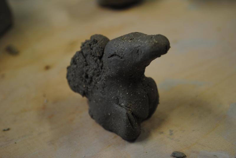 Clay sculpture of Cyndaquil (un-fired and un-painted).