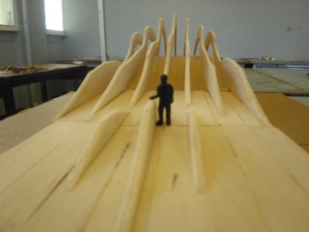 Front view, with human to scale made of plaster and sharpie.