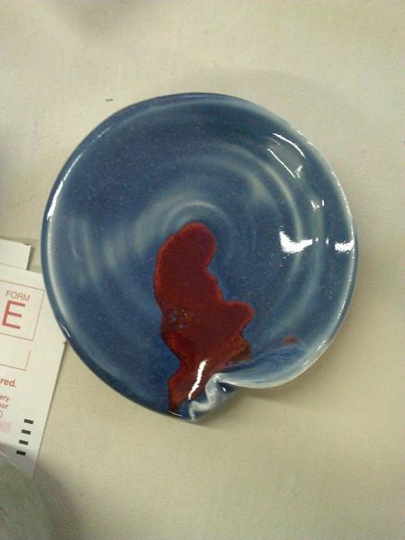 I piece that I made in my ceramics class. No title. It's made of porcelain and it's one of the only pieces that I was keeping for myself.