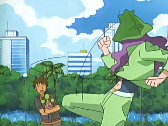 It looks like he's trying to beat up Brock, but he's actually just having a sissy fit over what May said to him. =]