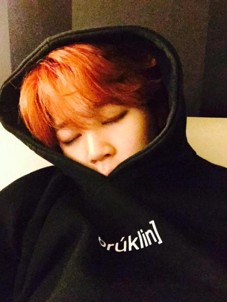 Jimin in hoodie and orange hair