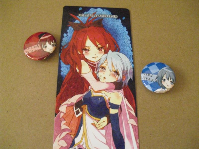 Kyoko and Sayaka from Puella Magi Madoka Magica c:
2 pins and a drawing a friend got for me when she went to an expo. 
I love this pairing. < w >