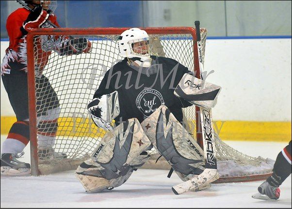 Me playing hockey at a tournament last summer. I'm probably the shortest goalie in the history of hockey, but we won the championship of our division 