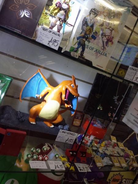 My Charizard inspired Statue for sale in a shop in Canterbury