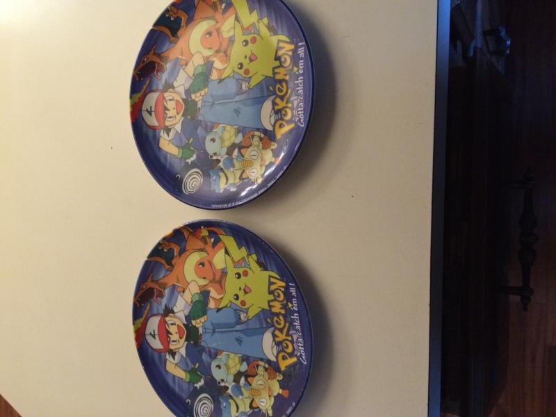 My Pokemon plates, I used to have the matching cups but when I was younger, my friend and I wanted cold water so we left them in the freezer and didn'