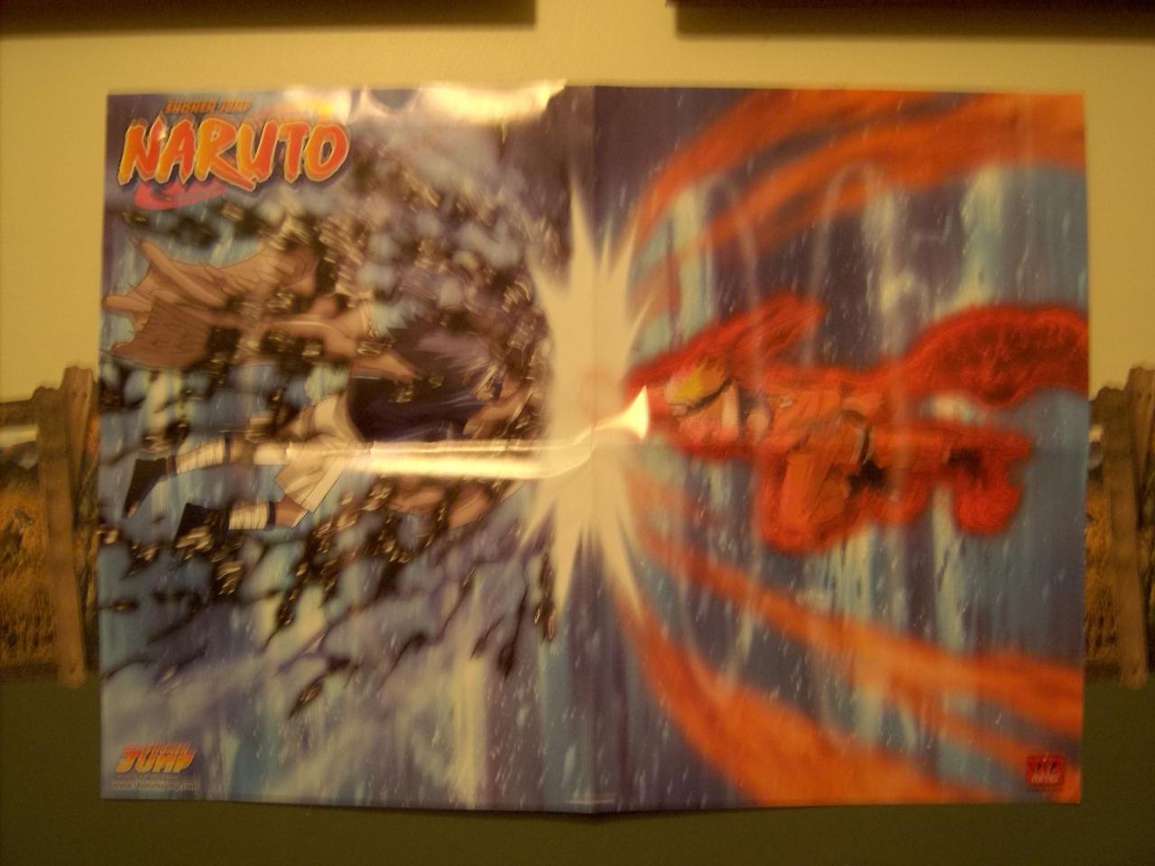 Naruto and Sasuke clashing.