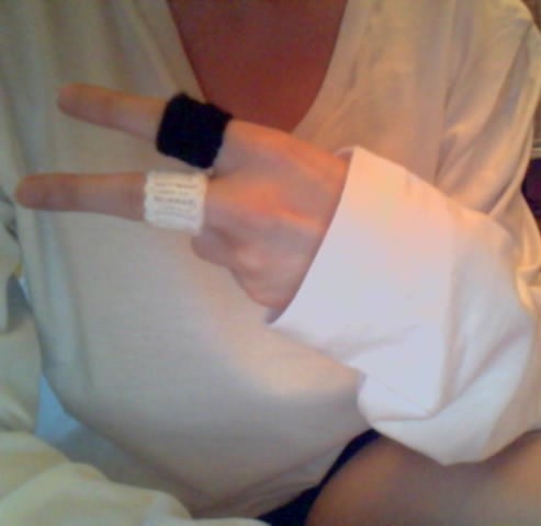 Roxas finger guards! XD And my L cosplay shirt. o;

My shorts look like undies. o_o; Oh wellz.