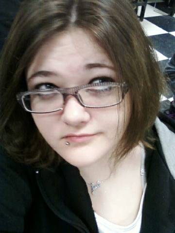 sitting in tha lunch room at school