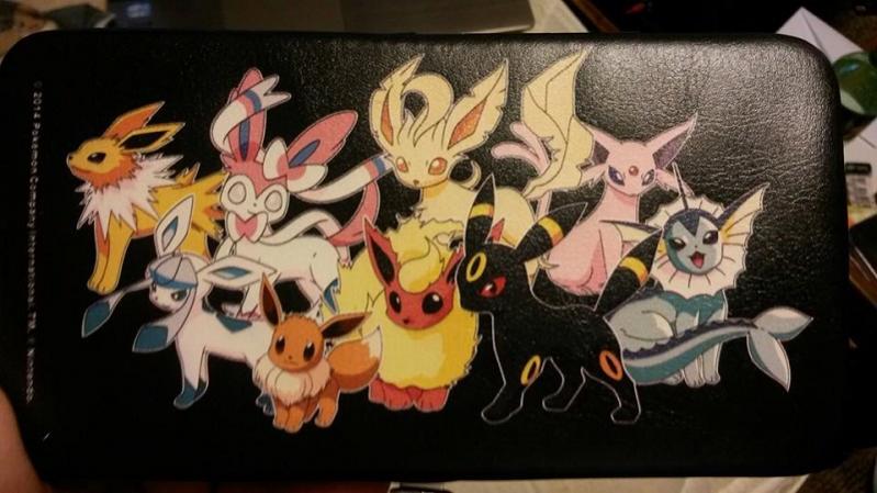 The back of the wallet that I ordered online on 6/9/2015. Hi miscolored Leafeon and Shiny Glaceon X3