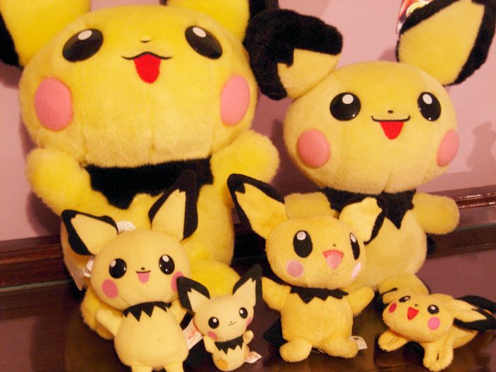 These are my Pichu plushies. The back two match in the sense that their RIGHT EARS ARE BROKEN. I don't know, but they wobble a lot and fall back all t