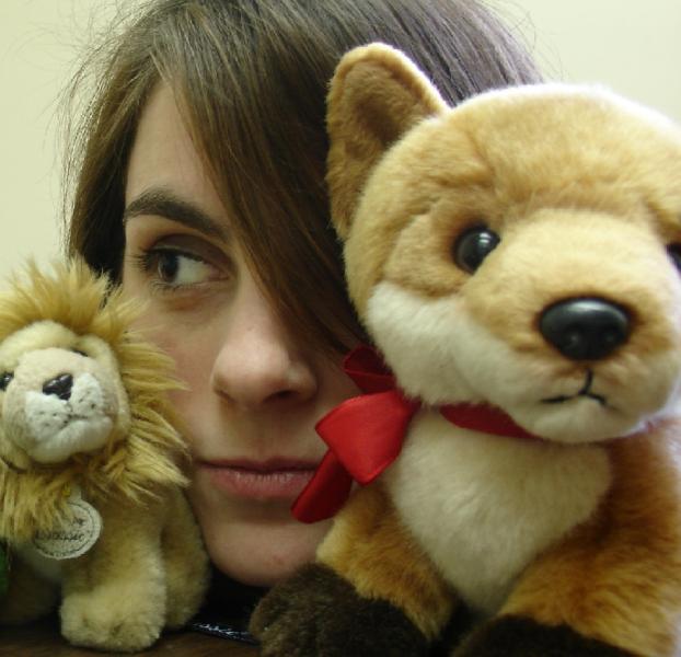 This is me with my good friends moe and miss miss. Mo's the lion and miss miss is the fox.