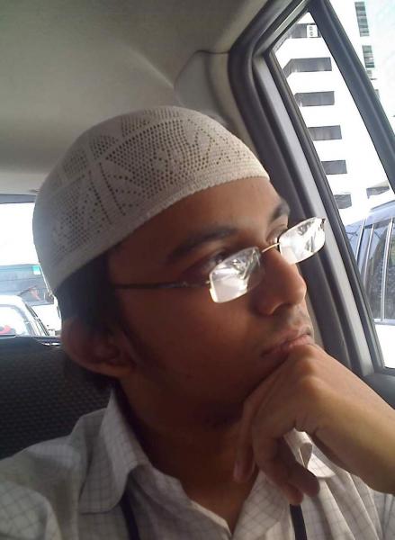 This was taken idk couple years back or so. Hassan contemplating on his schemes to bring about the perfect world: where chickens can cross the road wi