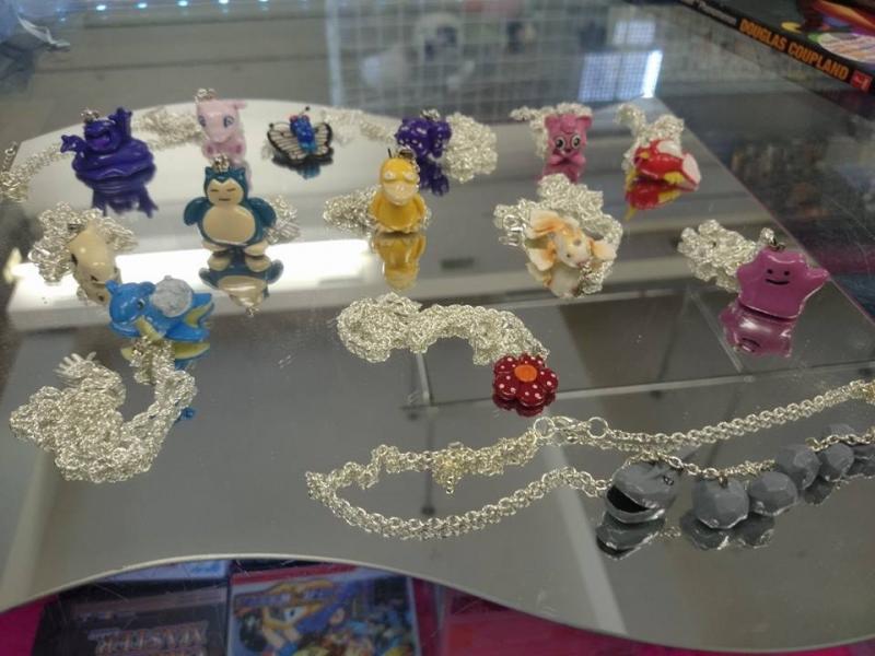 Various Hand made Pokemon inspired necklaces; Lapras, DItto, Goldeen, Butterfree, Muk, Mew, Magicarp, Jigglypuff, Snorlax, Cubone, Onix and Vileplume