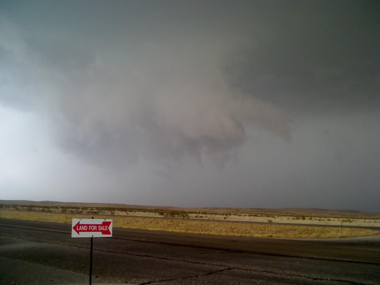 Wall cloud west Roswell, NM

Confirmed by the NWS Albuquerque office. http://www.srh.noaa.gov/abq/

Quote form an email I received form the office. "F